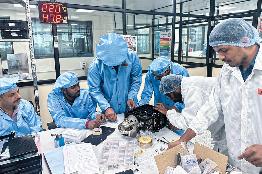 A team of engineers assembles an electric engine for satellites at the Bellatrix Aerospace lab in Bengaluru