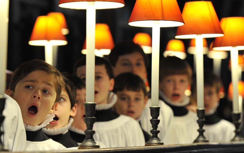 Choristers practise in the choir stalls of St Paul's Cathedral in London on December 12