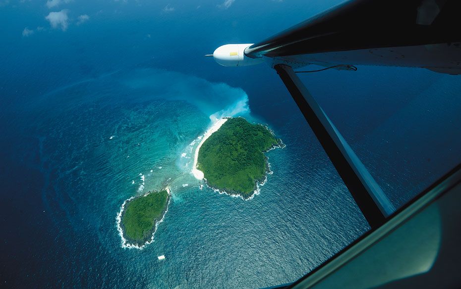 The picturesque North Cinque Island and South Cinque Island, joined by a sand bar, as seen from the 