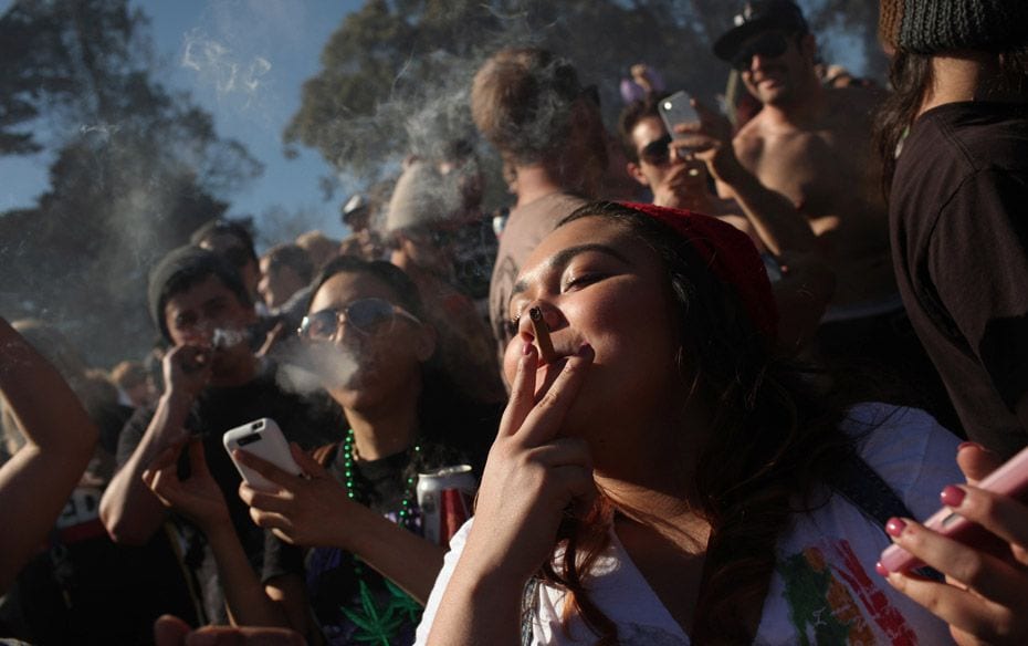 People smoke marijuana joints at 4:20 p.m. as thousands of marijuana  advocates gathered at Golden G