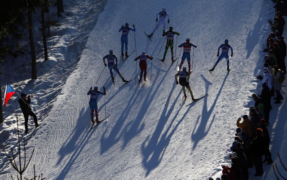 Athletes compete during the men's 4x10 km classic/free relay race at the Cross-Country World Cup