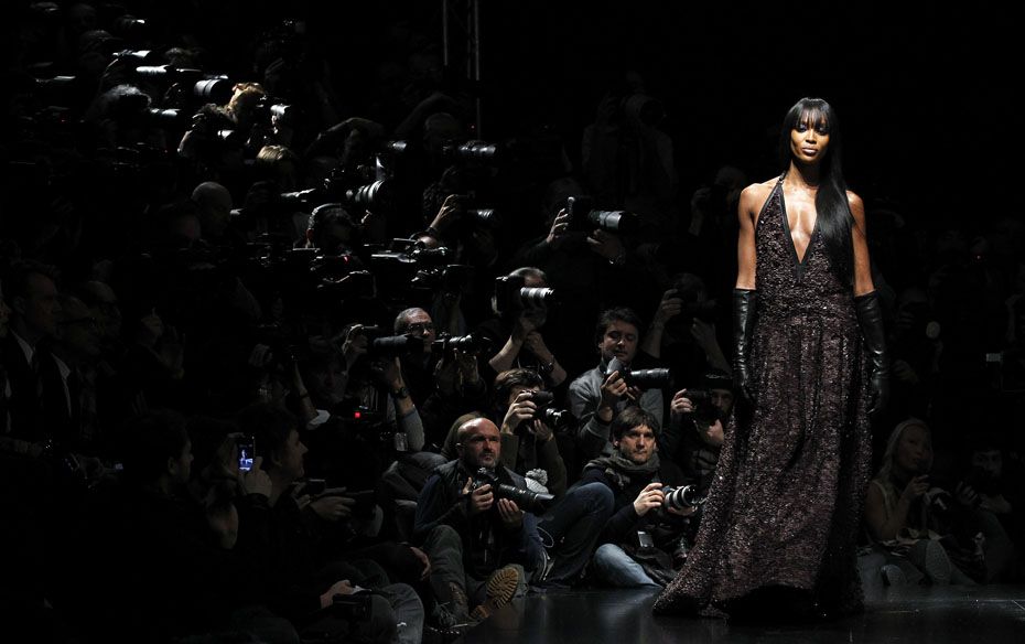 Former supermodel Naomi Campbell presents a creation from Roberto Cavalli's 2012 Autumn/Winter c