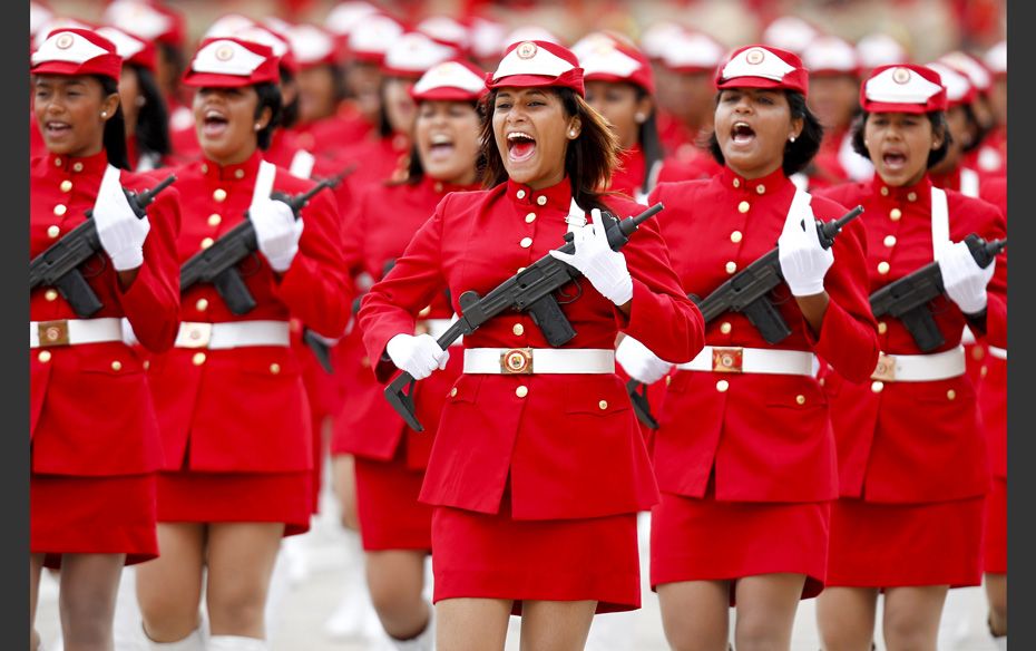 Venezuelan soldiers march during a military parade to commemorate the 20th anniversary of the failed