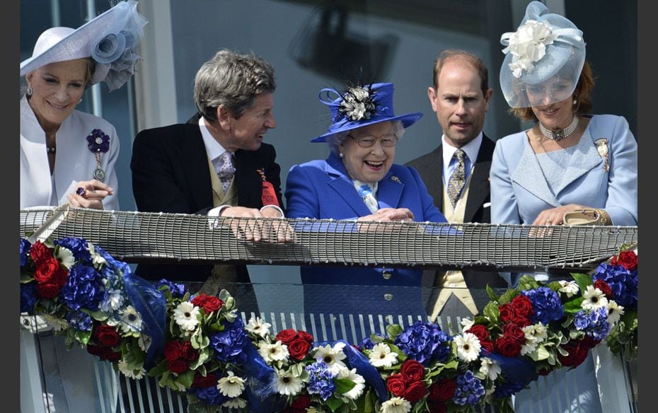 Britain's Queen Elizabeth smiles after the Derby horse race at the Epsom Derby festival in south