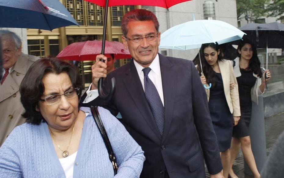 Rajat Gupta (C) exits the Manhattan Federal Court in New York May 21, 2012                          