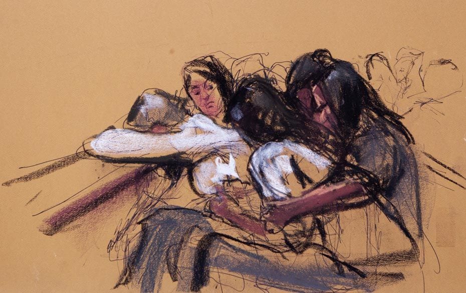 Sketch of the family of Gupta, seen hugging each other in this courtroom sketch in Manhattan Federal