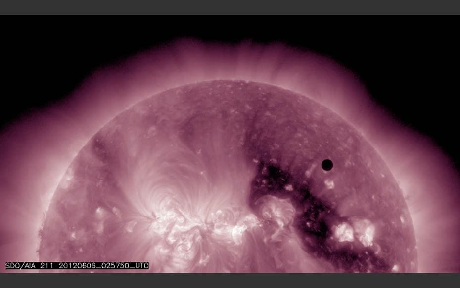 Planet Venus transiting the Sun                        