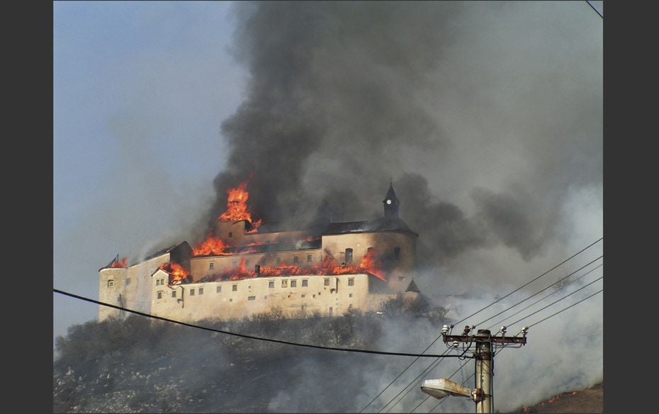 The Krasna Horka castle is seen on fire in the village of Krasnohorske Podhradie near Roznava, easte