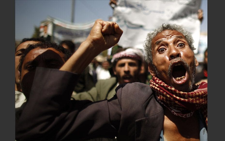 An anti-government protester during a protest to demand that relatives of Yemen's former preside