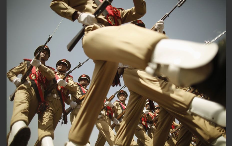 Military cadets march during a parade marking the 22nd anniversary of Yemen's reunification in S