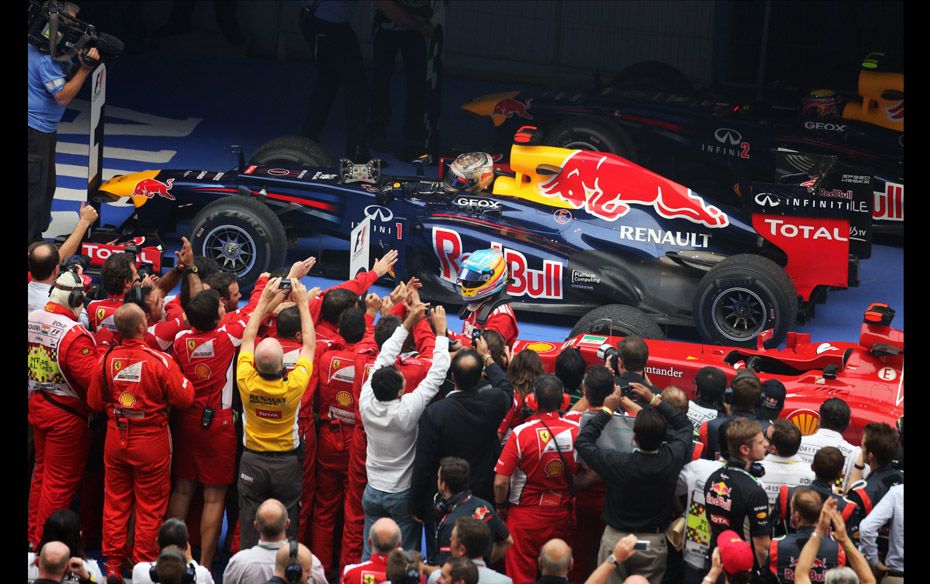 Race winner Sebastian Vettel (GER) Red Bull Racing RB8 celebrates in parc ferme                     