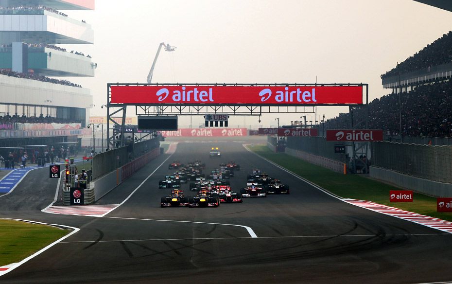 Sebastian Vettel (GER) Red Bull Racing RB8 leads at the start of the race                        