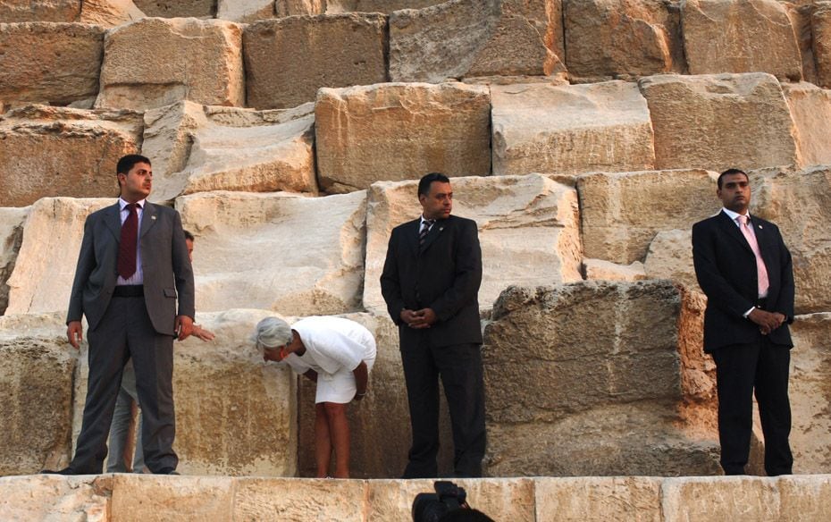 International Monetary Fund (IMF) Managing Director Christine Lagarde (2nd from left) checks some py