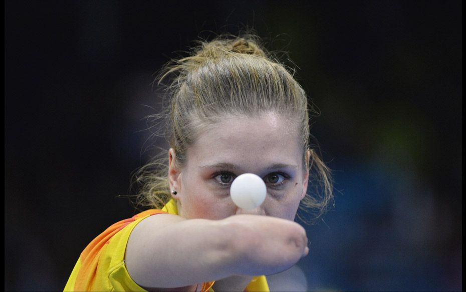 Natalia Partyka of Poland serves during her Women's Singles C10 table tennis classification matc