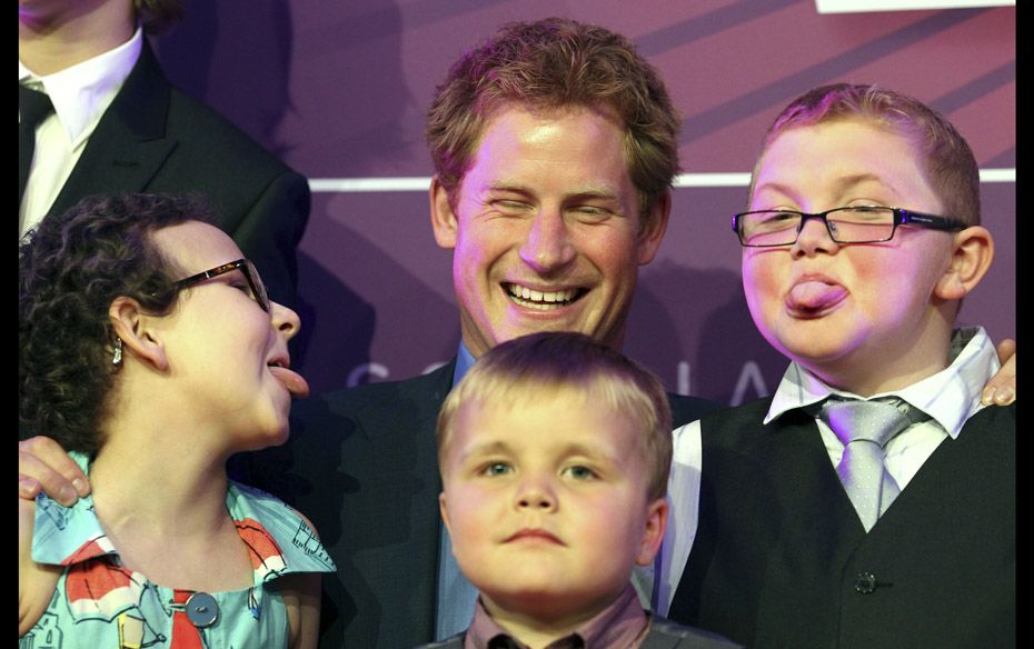 Britain's Prince Harry laughs during the WellChild awards ceremony at  the InterContinental Hote