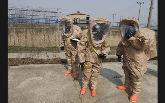 Soldiers of the US Army’s 23rd chemical battalion gear up to demonstrate their equipment, duri