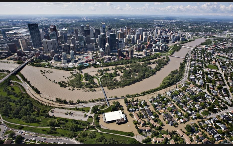 The Bow River overflows its banks into the downtown core and residential areas in Calgary, Alberta. 