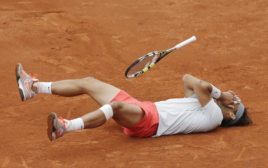 Rafael Nadal of Spain celebrates defeating compatriot David Ferrer in their men's singles final 