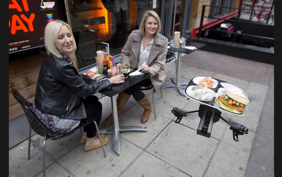 A flying sushi service tray known as the ‘itray’, created using miniature remote-control