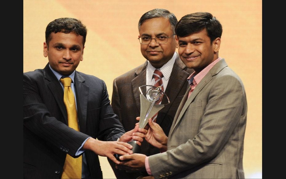 Phanindra Sama, redBus, receiving the award from B Sai Kumar, group CEO of Network 18               