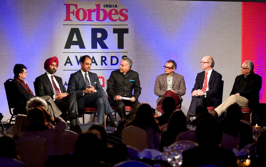 Suresh Venkat, consulting project editor, Forbes India (centre) conducts a panel discussion on India