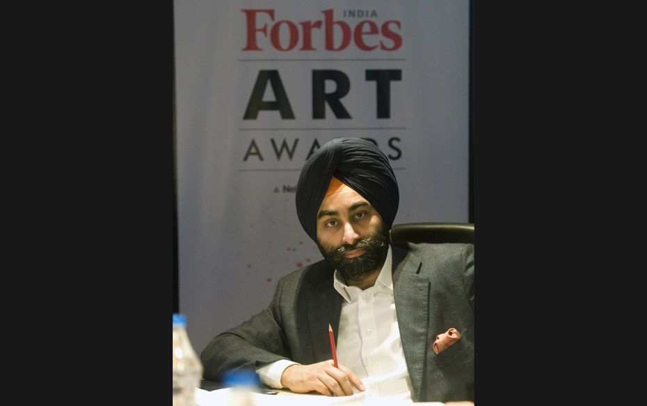 Fortis Healthcare Managing Director and avid art collector Shivinder Singh listens to his fellow jur