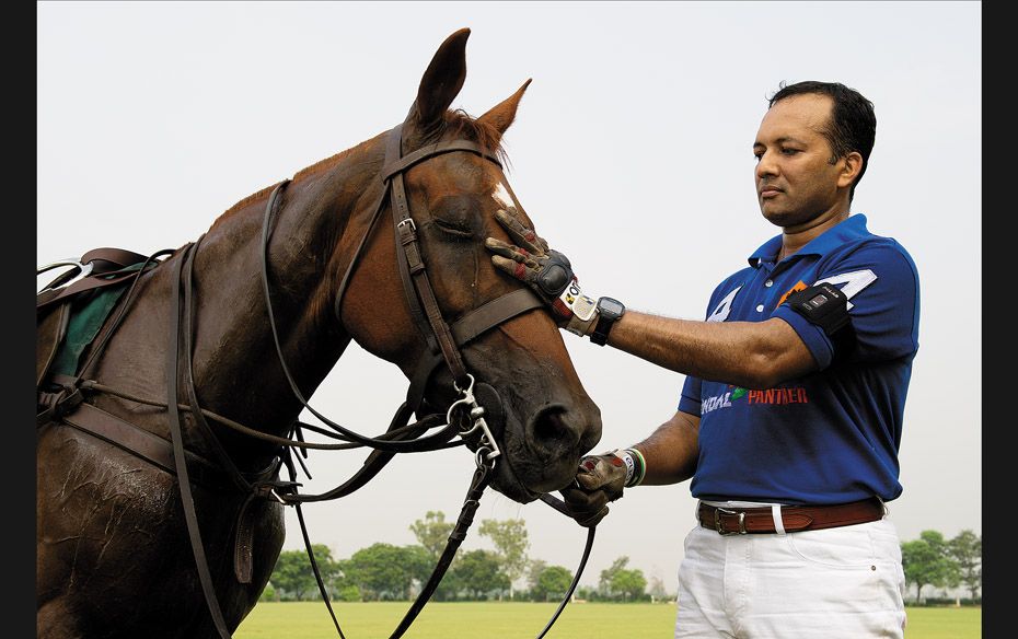 Jindal with his horse Fortuna. Though a busy man, Jindal prefers to buy his horses himself and trave