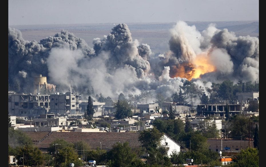 Smoke rises over the Syrian town of Kobani after an airstrike on October 18. A US-led military coali