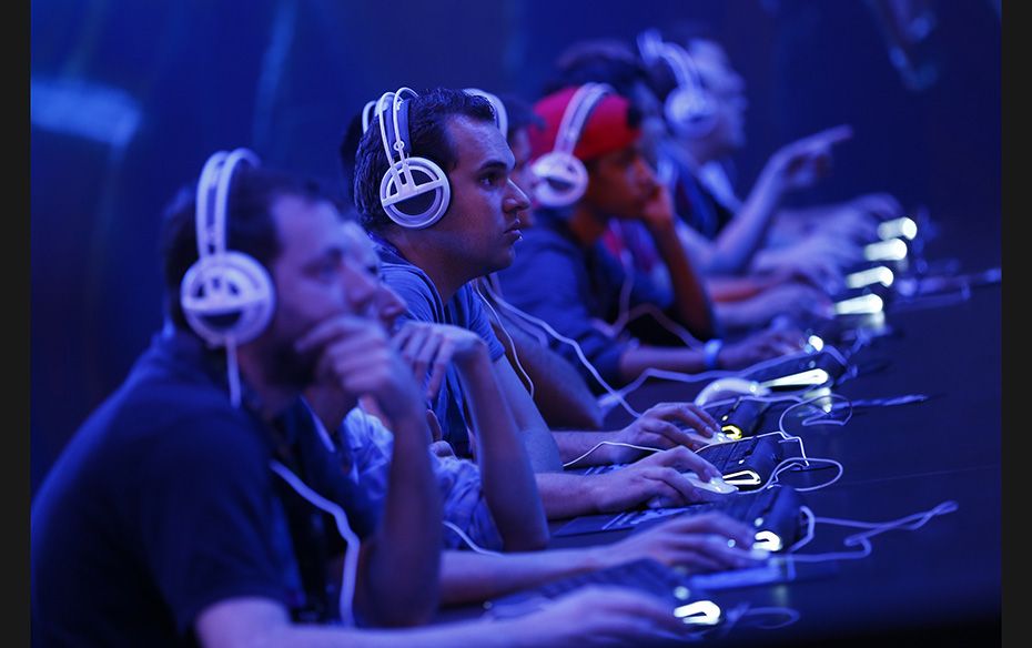 Gamers play the ‘StarCraft II’, developed by Blizzard Entertainment during the Gamescom 