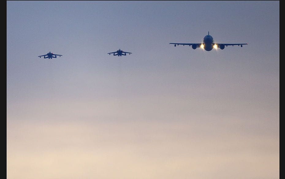 German air force Tornado jets and a cargo aircraft prepare for landing at an airbase in Incirlik, Tu