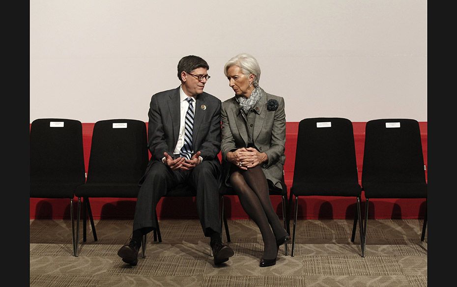 U.S. Treasury Secretary Jack Lew (L) talks with International Monetary Fund (IMF) Managing Director 