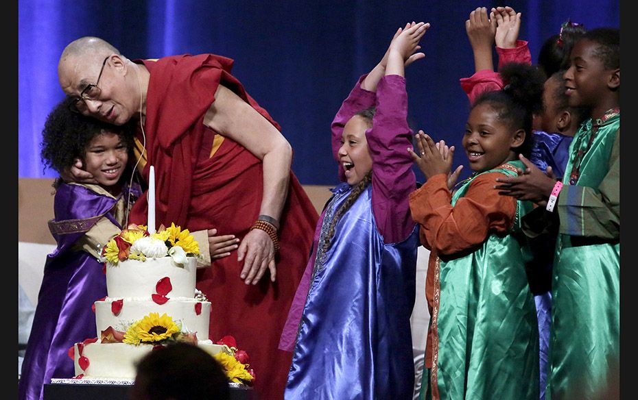 The Dalai Lama celebrates his 80th birthday with a group of children at the University of California