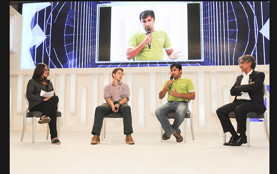 (Left to Right) Menaka Doshi, moderator; Greg Moran, co-founder, Zoomcar; Vikram Vora, CEO, MyDentis