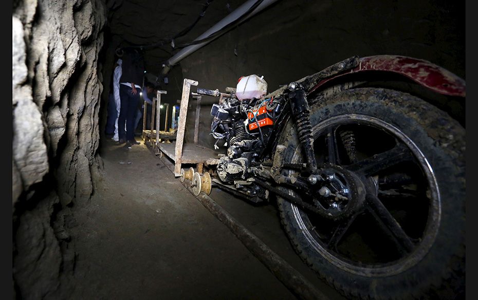 A motorcycle modified to run on rails is seen inside a tunnel connected to the Altiplano Federal Pen