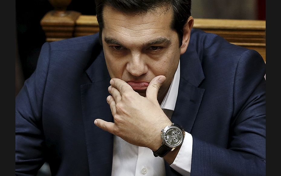 Greek Prime Minister Alexis Tsipras before his speech at a parliamentary session to brief lawmakers 