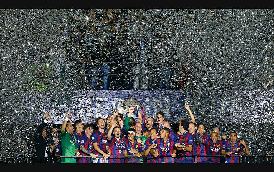 The Barcelona team celebrates after winning the UEFA Champions League in Berlin on June 7. Barcelona