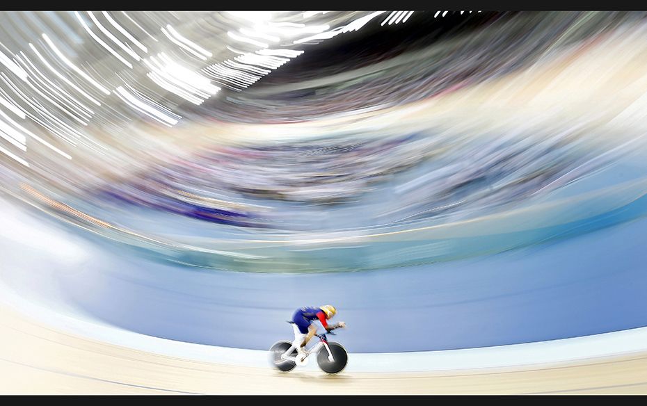 Bradley Wiggins pedals during his attempt to break cycling's hour record at the Olympic Velodrom