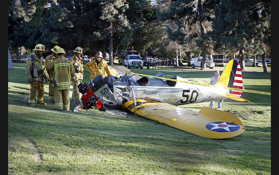 An airplane sits on the ground after crash-landing at the Penmar Golf Course in Venice, California, 