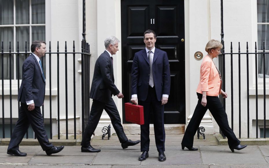  Britain's Chancellor of the Exchequer, George Osborne, with his Treasury team outside numb