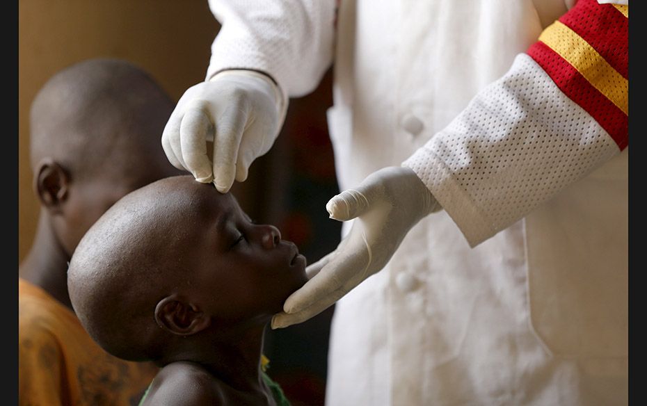 A child rescued from Boko Haram in Sambisa forest is attended to at a clinic at the Internally Displ