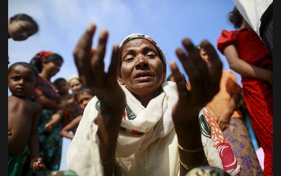 Zarli Hartu, 46, cries for her son Marmot Ismai, who she says was kidnapped into a human trafficking