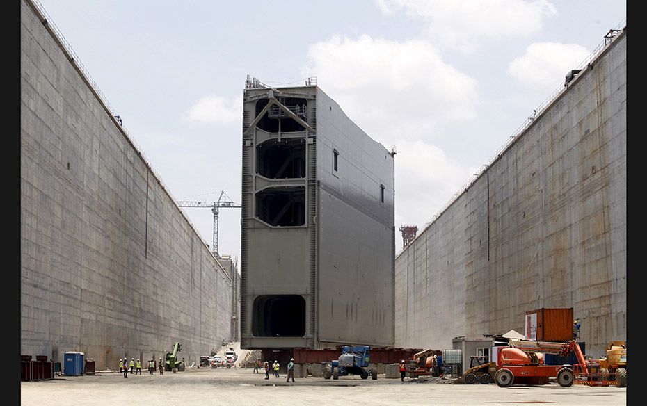 A steel rolling gate, part of the last set of locks on the Pacific side, being installed as part of 