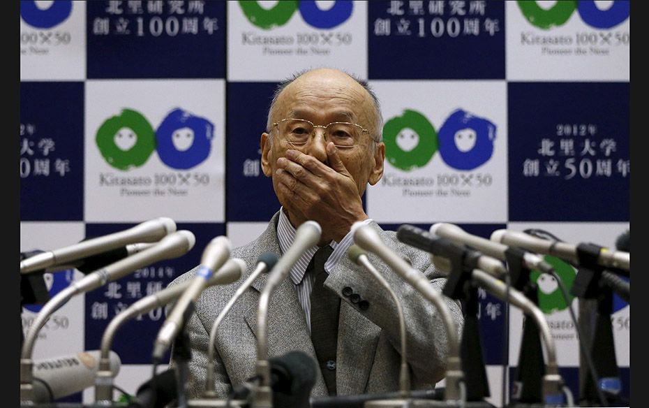 Satoshi Omura, professor at Kitasato University, reacts as he attends a news conference in Tokyo on 