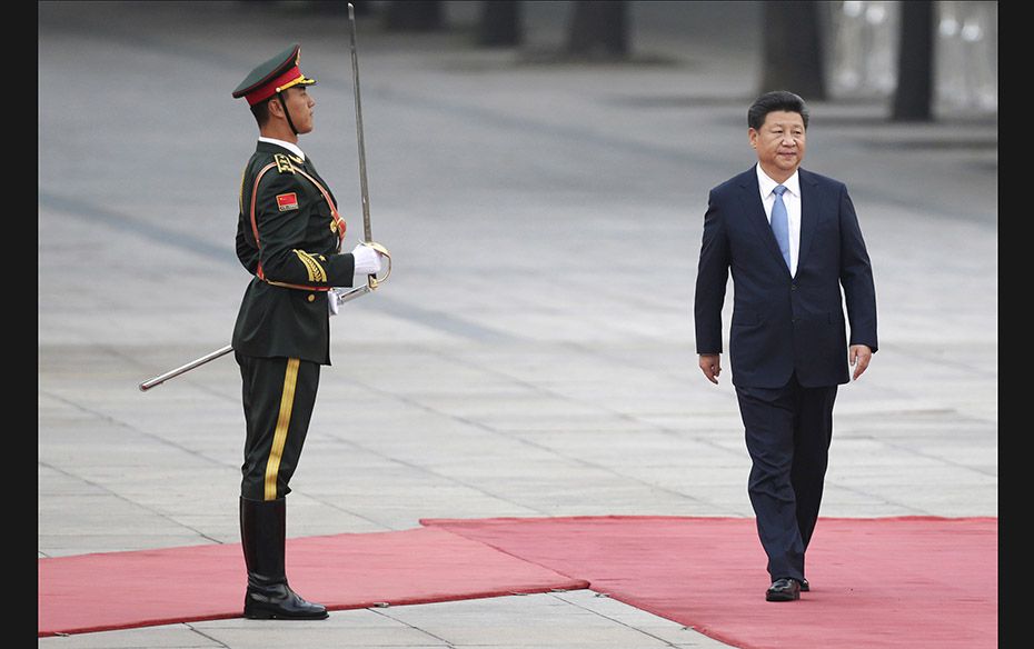 China's President Xi Jinping attends a welcoming ceremony outside the Great Hall of the People i