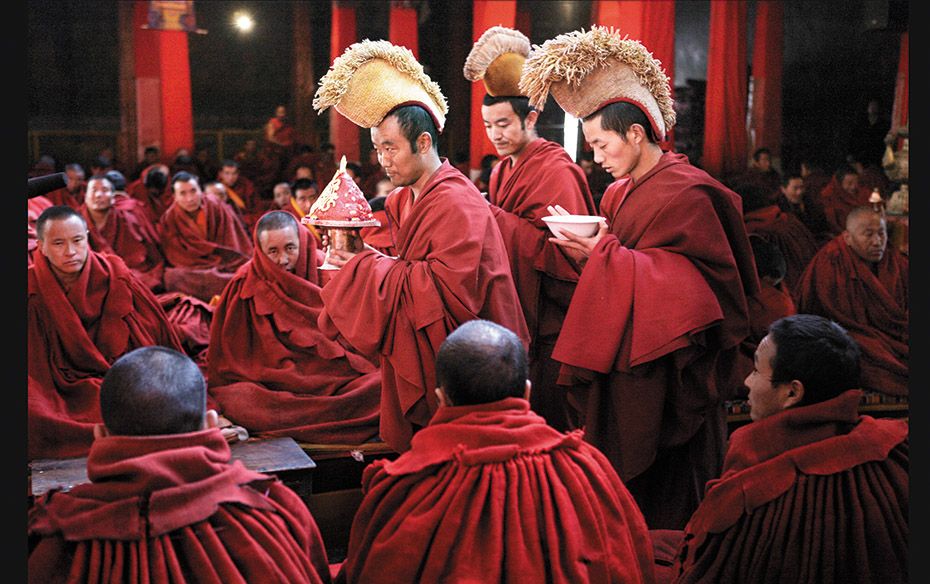 Tibet Monks at Sera, one of the largest monasteries of Gelugpa, near Lhasa, gather at the main assem