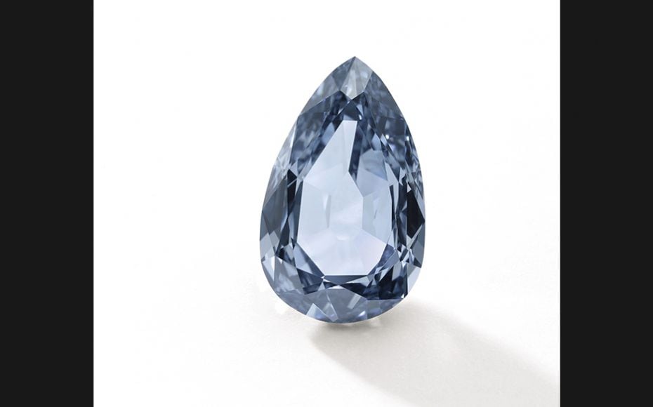 Superb fancy vivid blue diamond ring:  Set with a pear-shaped fancy vivid blue diamond of excep