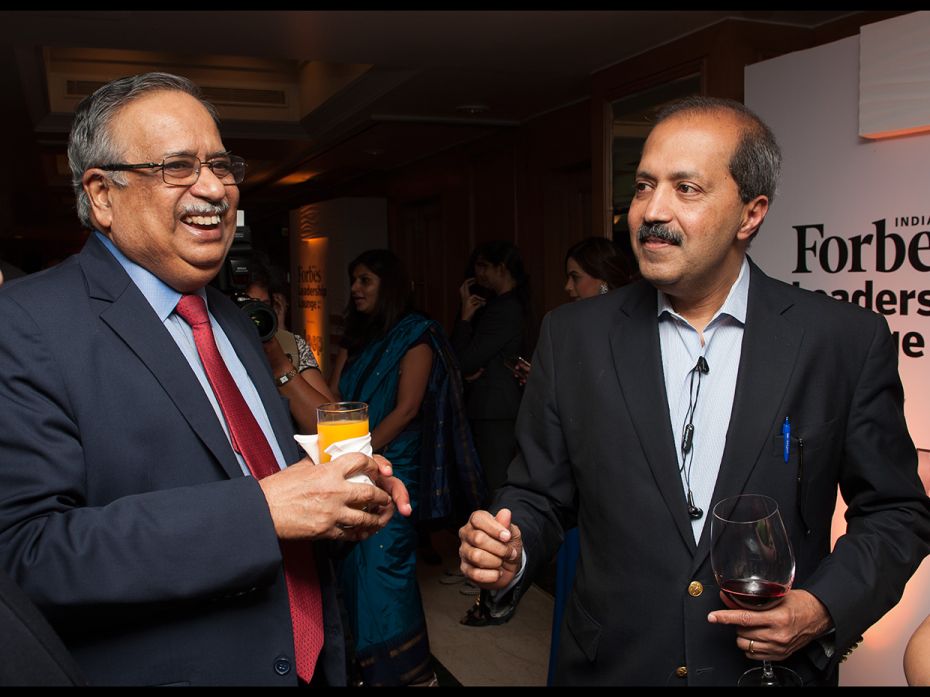 Former SEBI chief M Damodaran with KKR chairman Sanjay Nayar                        