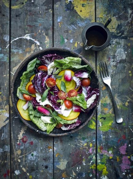 Name of photo: Salad PlateDescription: A metal plate, with a mixture of leaf salad and tomatoes on a