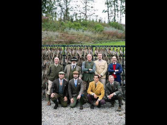 Name of photo: Hunters and Kill Description: Wealthy Italian hunters line up for a portrait in front