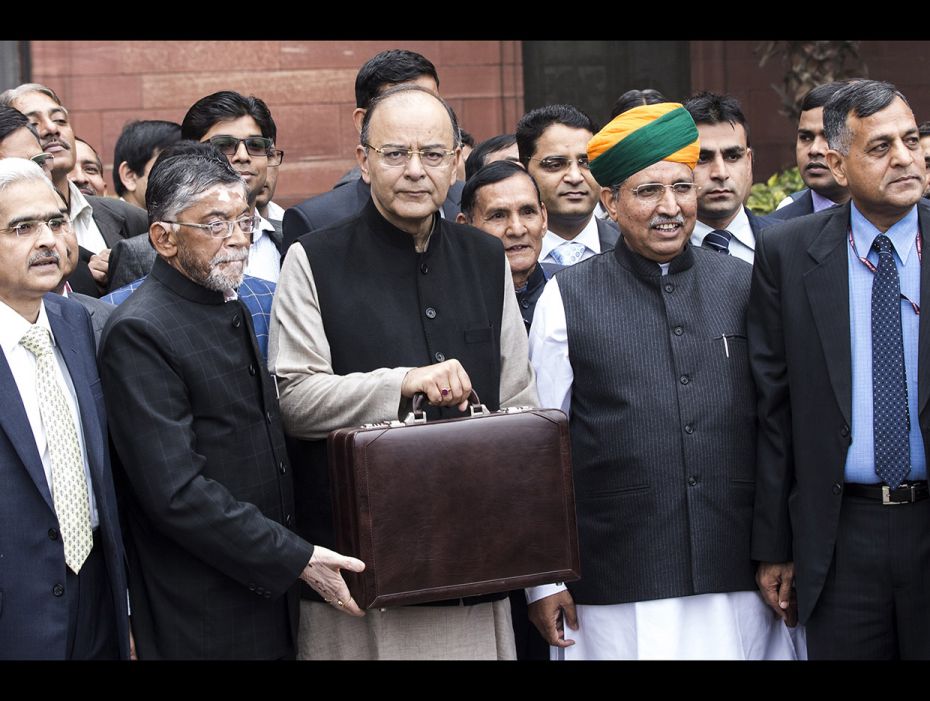 Arun Jaitley (centre) and other members of the finance ministry outside the North Block of the Centr